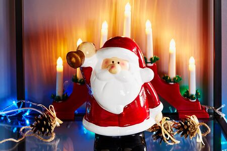 Santa Claus with a decorated Christmas treeの写真素材