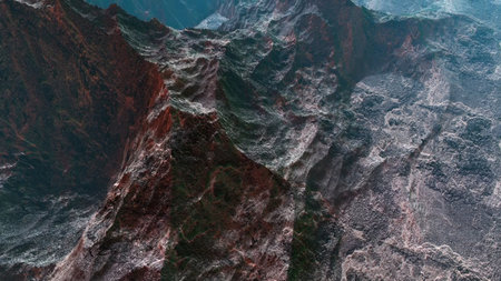 Aerial view of rough mountain peaks forming a deep canyonの写真素材