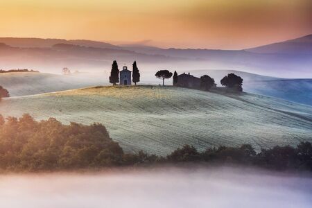 Well known abandoned church in Tuscany at sunriseの写真素材