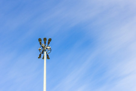 lighting mast lantern construction on blue sky background