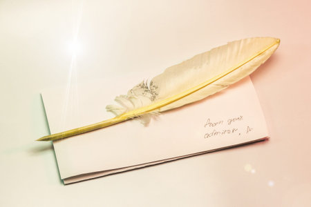 writing letters with feather pen from admirer messageの写真素材