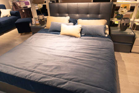 Bed in furniture store shop interior style comfortable bedroomの写真素材