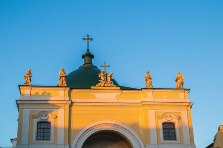 Catholic Church of St Catherine figures of four evangelists and angels sunset