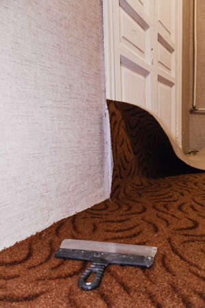 Pruning cutting carpet construction work laying floor sharp blade knife masterの写真素材
