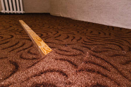 Pruning cutting carpet construction work laying floor sharp blade knifeの写真素材