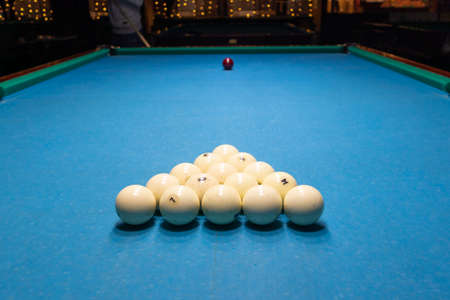 billiards smashing pyramid balls kick game start disparatenessの写真素材