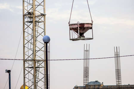 pouring concrete foundation building house construction crane developer contractor jobの写真素材