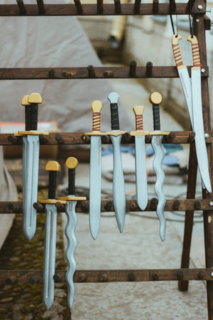 knives blades shield medieval toys for children handmade fair.concept medieval game