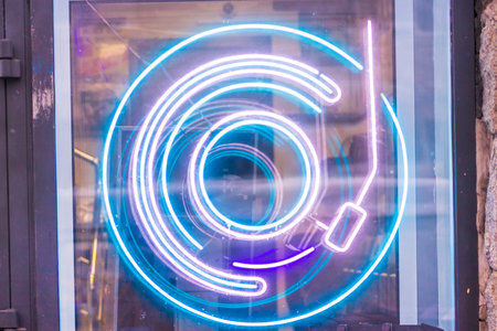 vinyl player neon sign disk record shop vintage analogの写真素材
