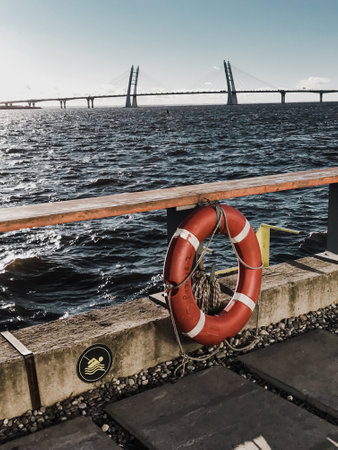 life ring sign swimming forbidden waves pier rules oceanの写真素材