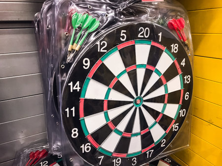 Darts on the wall, game sports target round, hanging on the wall of sporting goods store. concept competition sportの写真素材
