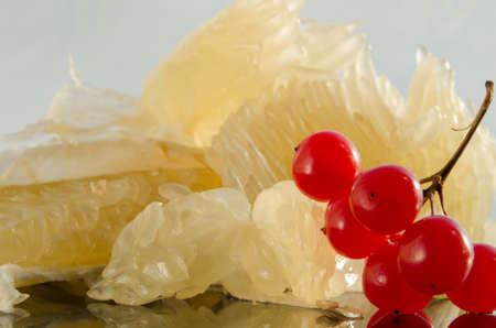 fresh red berries and pomeloの写真素材