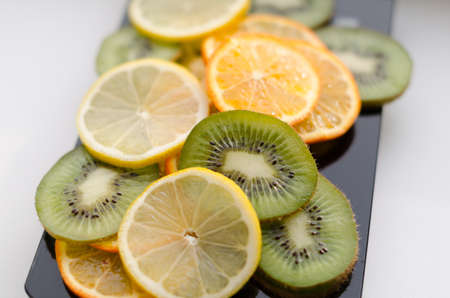 slices of fruit on a white backgroundの写真素材