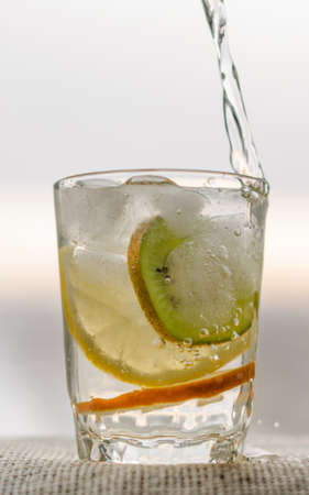 pieces of fruit in a glassの写真素材