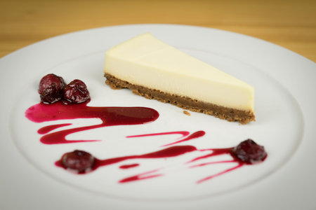 Cheesecake from white chocolate on white plate