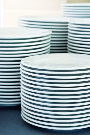 stacked of plates for restaurant and hotel の写真素材