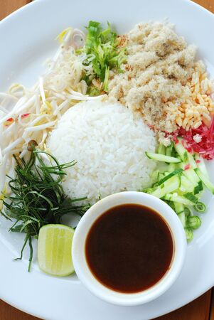 Thai rice salad serves with various vegetable and shrimp paste sauceの写真素材