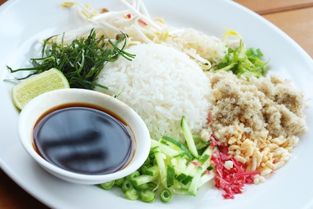 Thai rice salad serves with various vegetable and shrimp paste sauceの写真素材