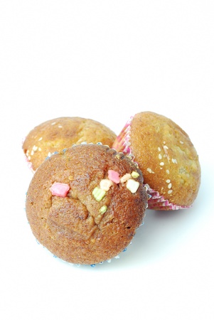 isolated group of three banana cup cake on white backgroundの写真素材
