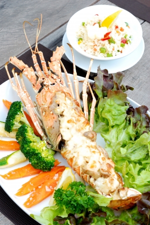 close up baked lobster with cheese serves with riceの写真素材