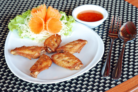 deep fry chicken wings with spicy sauceの写真素材