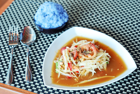 thai spicy papaya salad with sticky riceの写真素材