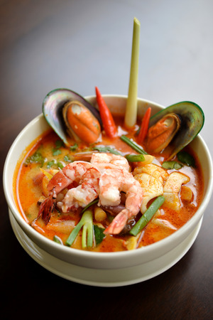 Popular Thai tomyam soup with seafood and Thai herbsの写真素材