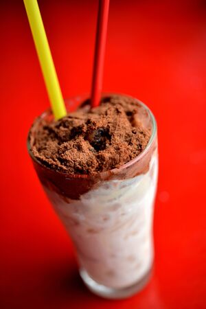 Close up ice chocolate topping with chocolate powderの写真素材