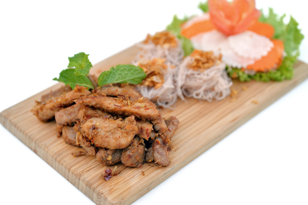 Close up spicy fry pork with rice noodleの写真素材