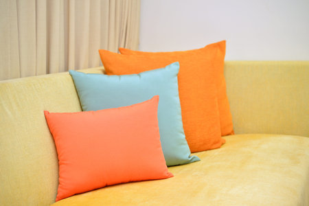 colorful pillow set on sofa in the roomの写真素材