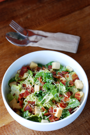 Caesar salad with crispy bacon and cheeseの写真素材