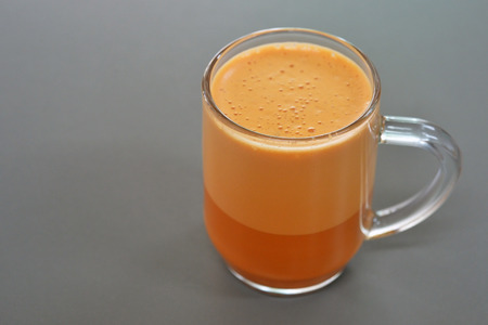 Milk tea on grey backgroundの写真素材