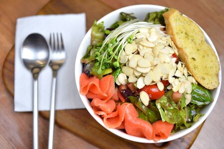Selective focus of Smoked salmon salad bowl with mix fresh vegetableの写真素材