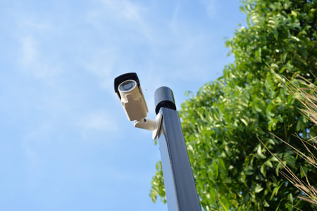security camera and urban video on blue sky