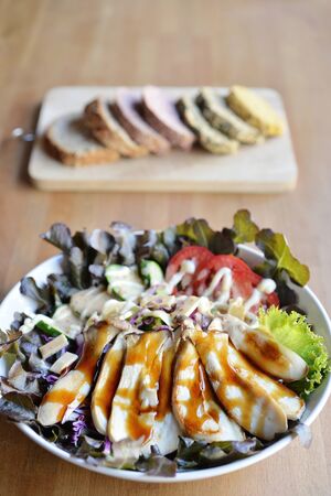Grill Mushroom salad with fresh mix vegetable and sesame dressing, Japanese styleの写真素材