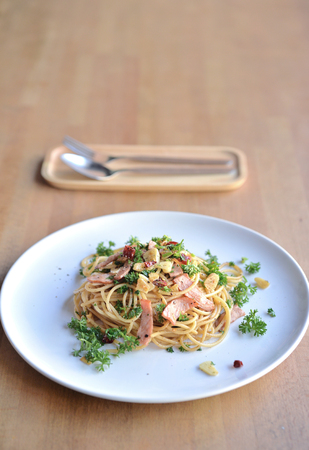 Selective focus of spaghetti with spicy chili and hamの写真素材