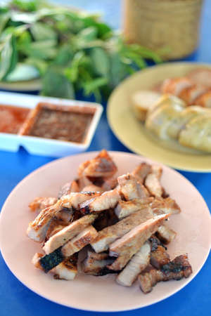 Selective focus of grill pork sliced with sauce, popular Thai foodの写真素材