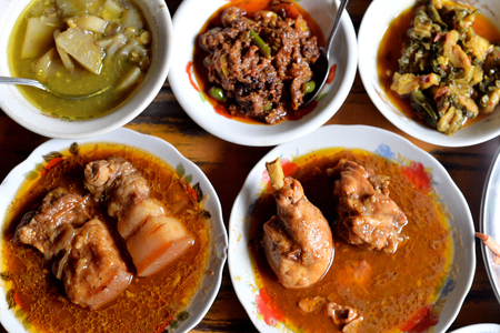 Selective focus of pork and chicken curry and various, Myanmar food setの写真素材
