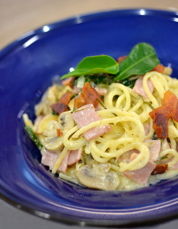 Spaghetti Carbonara with bacon and ham, selective focusの写真素材