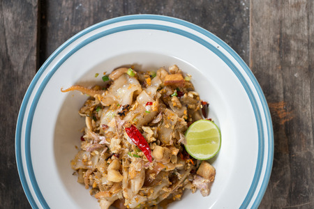 Stir fried rice noodle with chicken and egg, famous Thai food, selective focusの写真素材