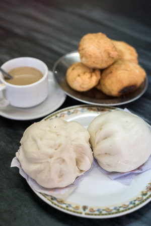 Selective focus of Chinese bun with teaの写真素材