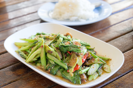 Fried Chinese kale with dried fish, selective focusの写真素材