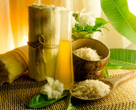 spa massage setting at sunset with candlelightの写真素材