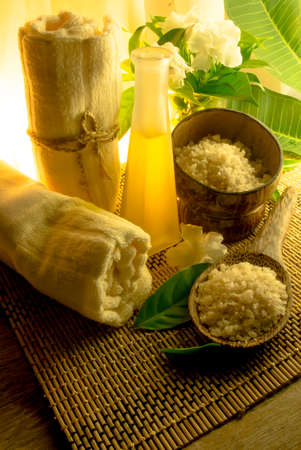 spa massage setting at sunset with candlelightの写真素材