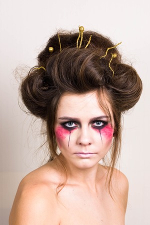 halloween make up beautiful model with perfect hairstyle. concept.の写真素材