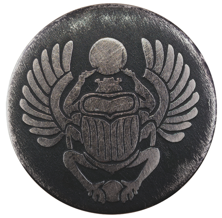 Scarabaeus carved in silver coin isolated on white background, an Anciant egyptian scarab beetleの写真素材