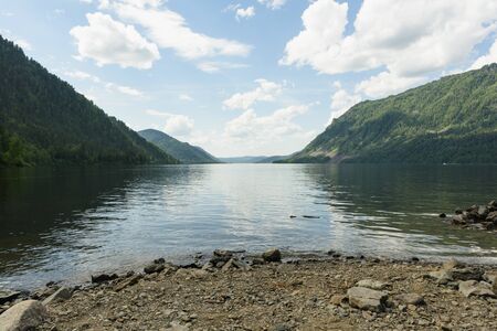 a trip along Teletskoye Lake on a motorboat in the Altai Mountainsの写真素材