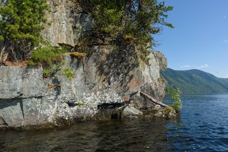 a trip along Teletskoye Lake on a motorboat in the Altai Mountainsの写真素材