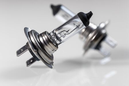 car burned out headlight lamp H7 with clipping path on whiteの写真素材