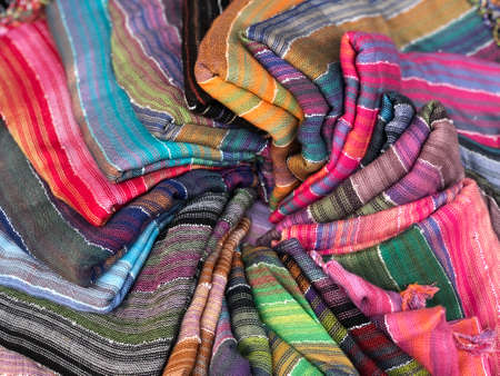 Morocco,Medina of Essaouira. 15 August 2018: Handmade cotton and Silk scarf.Multi different colors and patterns on the market,in a factory shop or store or bazar. card from Moroccoのeditorial素材